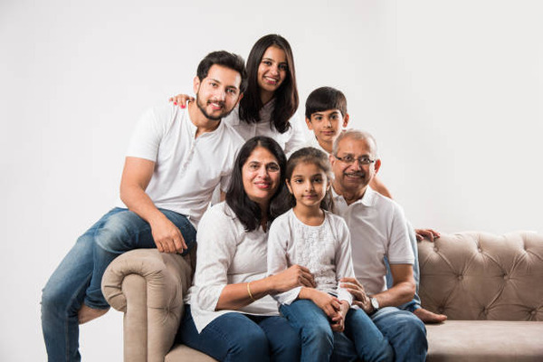 Family sitting together on a sofa Safemind Studio in Baner